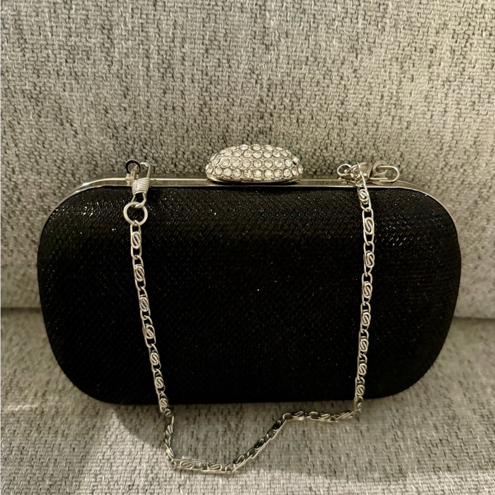 Sparkling black clutch.